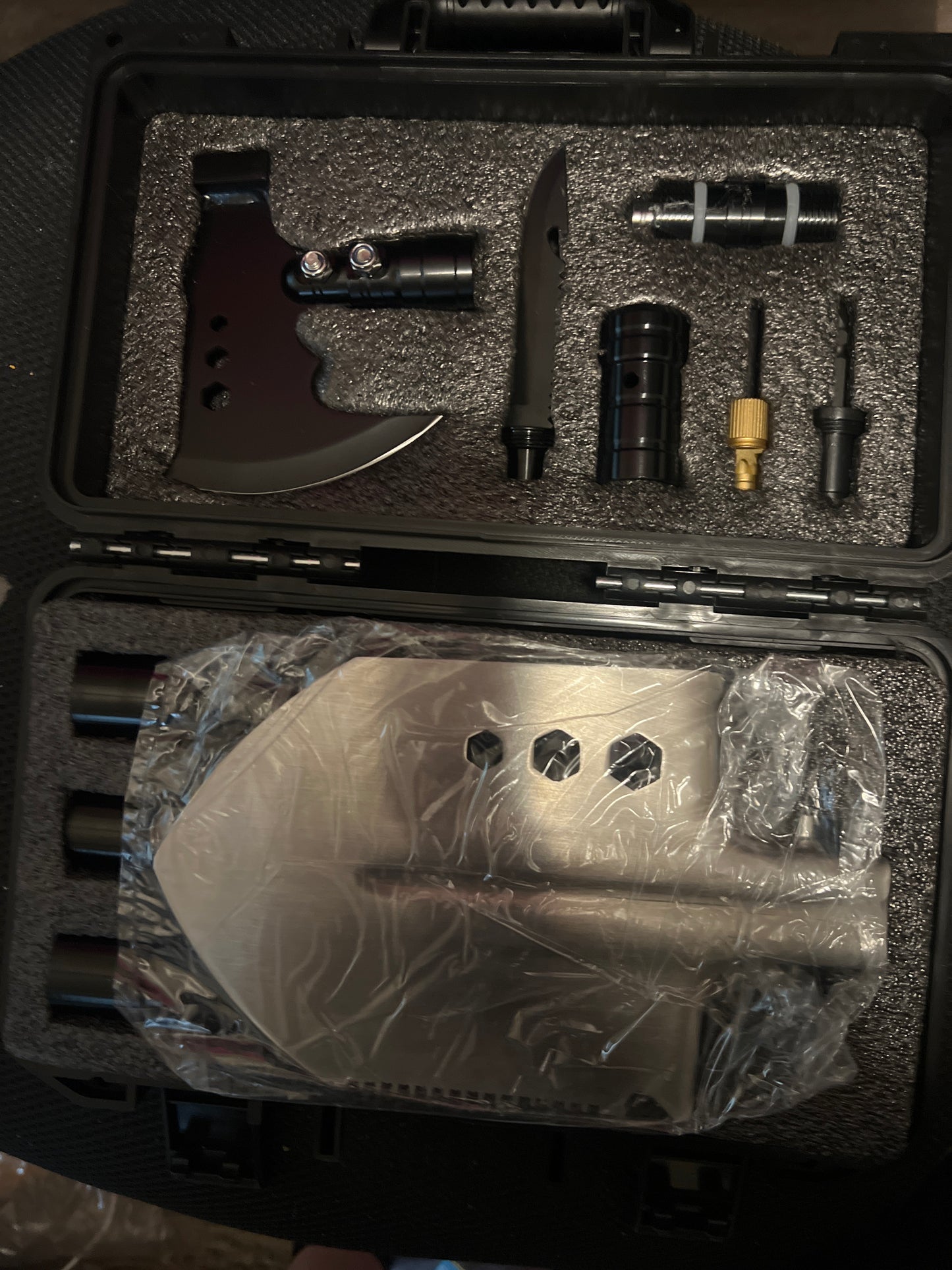 Multi tool travel hard case shovel, knife, axe, and more.