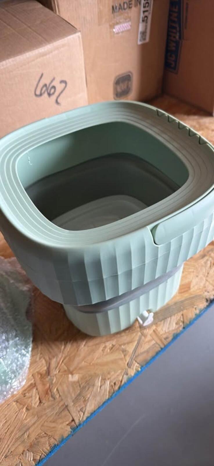 Portable electric washing machine